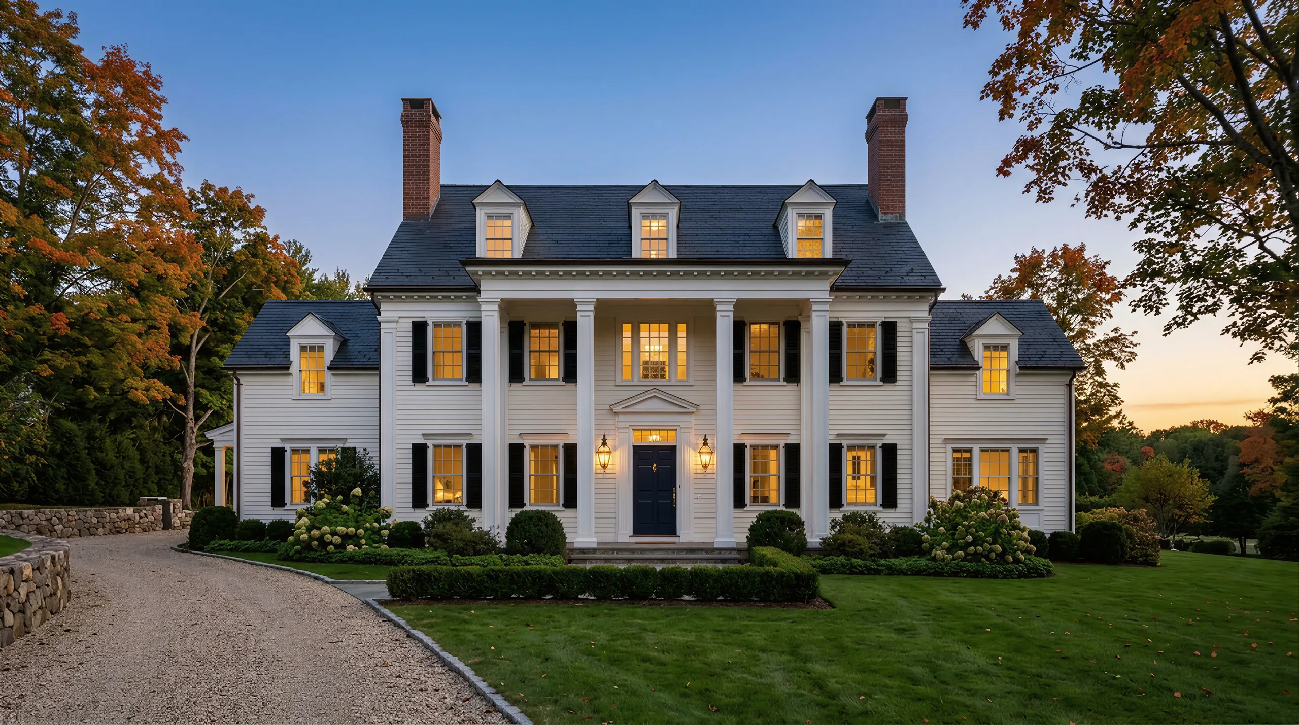 A white colonial house with black shutters and a navy front door at dusk (illustrative, generated).